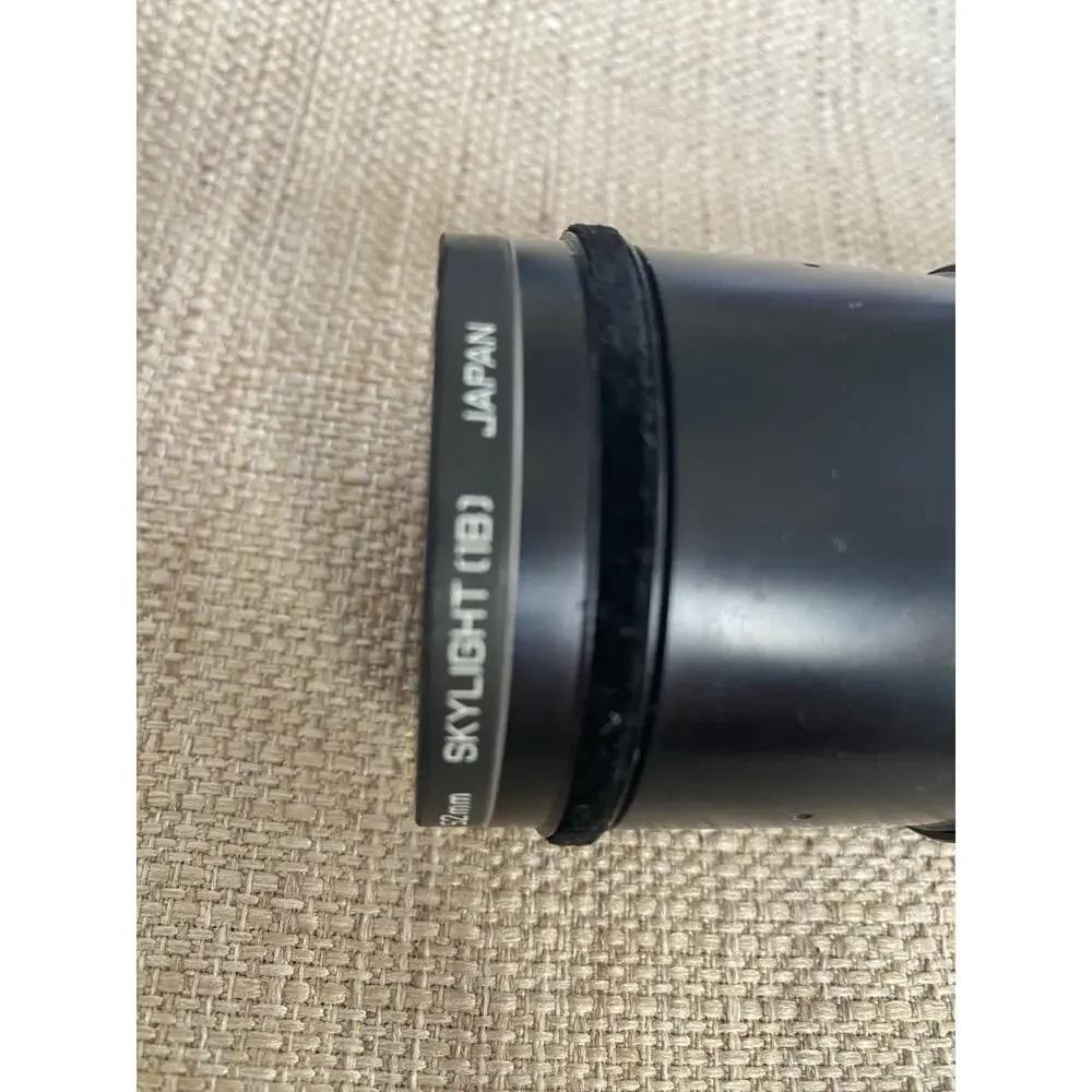 Vintage Minolta MC Tele Rokkor-PE 200mm f/4.5 manual focus telephoto lens.